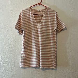 Pink and white striped T-shirt with triangle cut out in front